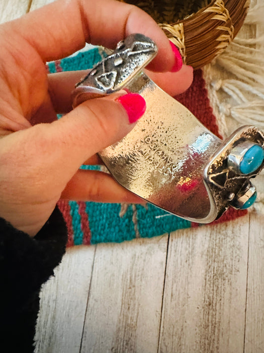 Navajo Turquoise & Sterling Silver Thunderbird Tufa Cast Cuff Bracelet by Delbert Arviso