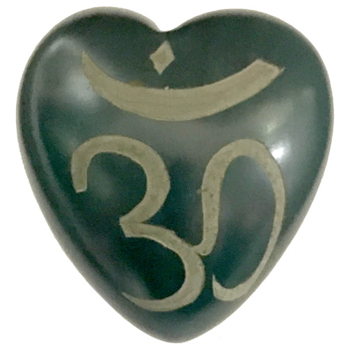 <center>Medium Grey Soapstone Heart Etched OM Symbols</br>3 1/4'' high x 3'' wide x 1 1/2'' deep</br>Crafted by Artisans in Haiti</center>