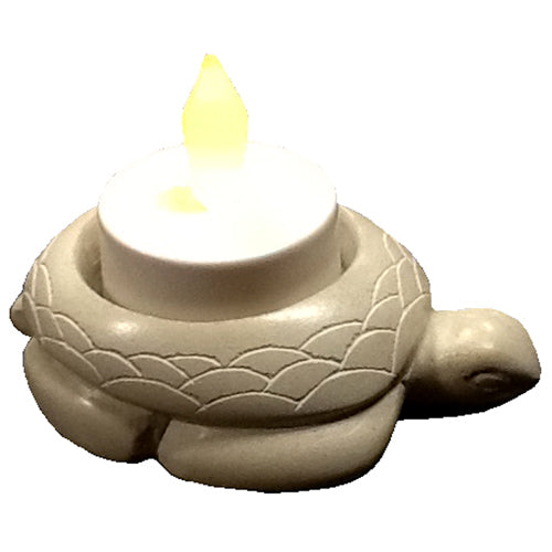 <center>White Soapstone Turtle Tealight Figurine</br>1'' high x 2 1/8'' wide x 3 3/8'' deep</br>Crafted by Artisans in Haiti</center>