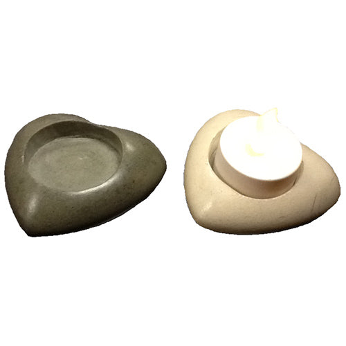 <center>White or Grey Soapstone Heart Tealight Figurine</br>1'' high x 3'' wide x 3'' deep</br>Crafted by Artisans in Haiti</center>