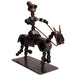 <center> Junkyard Cowboy Crafted by Artisans in India</br>Measures 7" high x 8" long x 3" wide</center>