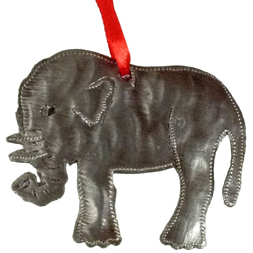 <center>Upcycled Metal Elephant Ornament</br>Measures - 3-1/2" high x 4-1/4" wide<br/>Handmade from Metal Drums in Haiti</center>