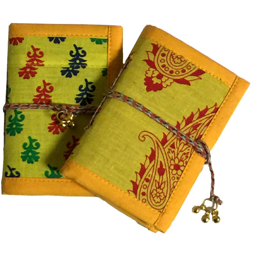 <center>Small Yellow Patchwork Journals </br>Crafted by Artisans in India </br>Measures 5” high x 3-1/2” wide x 48 sheets</center>