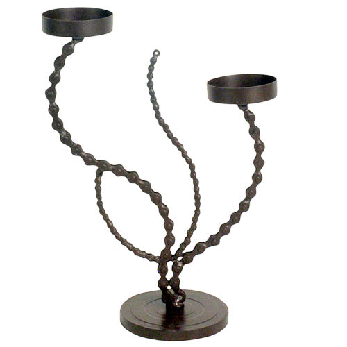<center>Flower Candle Holder made of Bicycle Chain </br>Crafted by Artisans in India </br>Stands 10-1/4” high x 7” wide, with a 3-1/2” diameter base</center>