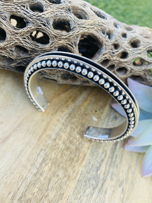 Navajo Hand Crafted Sterling Silver Cuff Bracelet By Tom Hawk