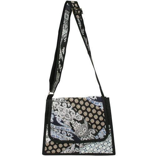 <center>Black and White Patchwork Shoulder Bag </br>Crafted by Artisans in India </br>Measures 11” high x 12” wide x 2-1/2” deep at base</center>