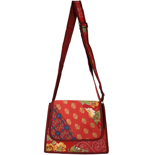 <center>Burgundy and Red Patchwork Shoulder Bag </br>Crafted by Artisans in India </br>Measures 11” high x 12” wide x 2-1/2” deep at base</center>