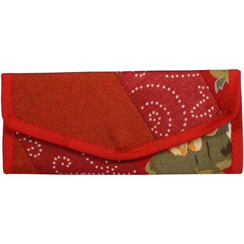 <center>Red Tone Patchwork Clutch </br>Crafted by Artisans in India </br>Measures 3-1/2” x 8-1/2” when closed</center>