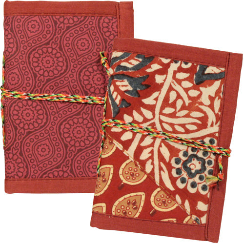 <center>Small Burgundy and Red Patchwork Journals </br>Crafted by Artisans in India </br>Measures 5” high x 3-1/2” wide x 48 sheets</center>