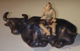 Ceramic Figure Man Sitting On Sitting Buffalo Large - Culture Kraze Marketplace.com